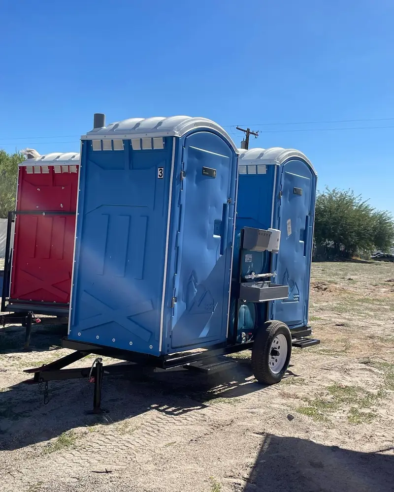Portable toilets loaded on a delivery trailer